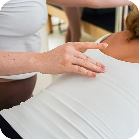 Close-up of a corrective Pilates assessment